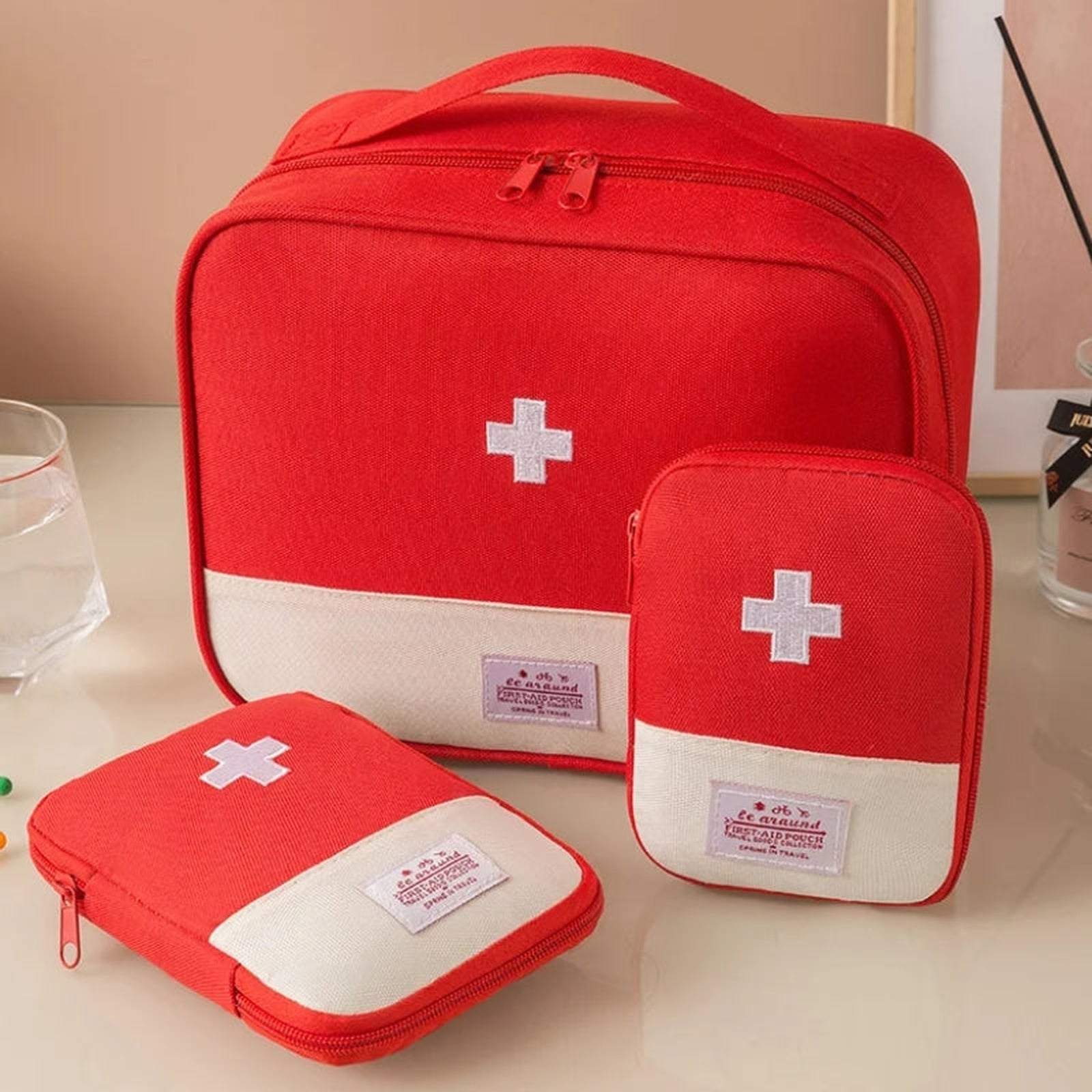 travel medication pouch three sizes visible - Yellow - Red - Pink - Blue