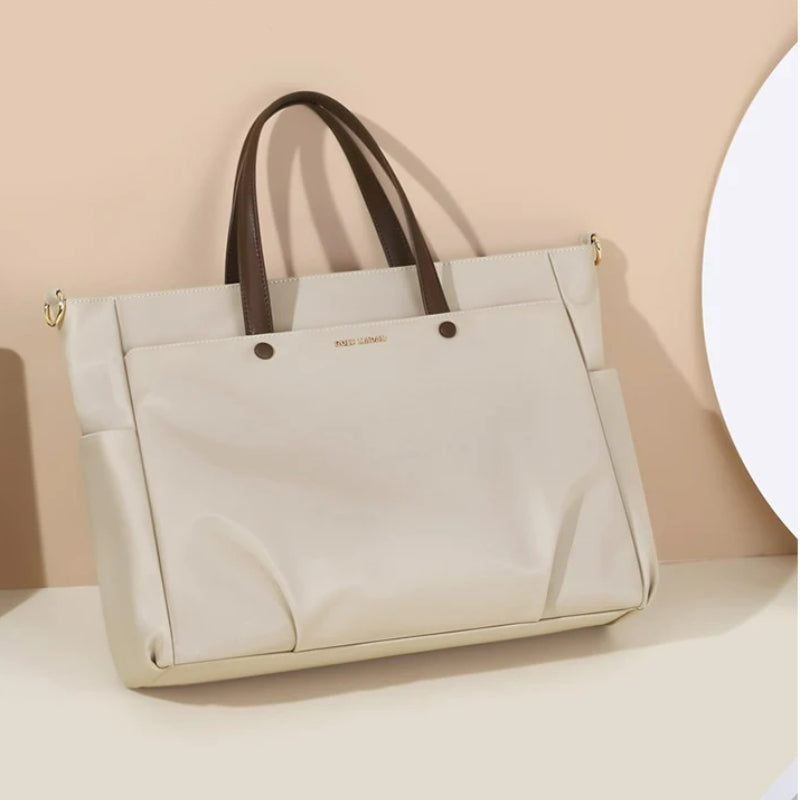 women's travel handbag close up on bag - Beige - Pink - Black