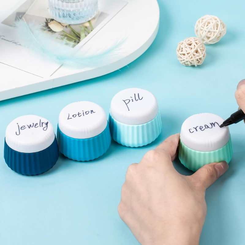 empty travel bottle for cream four bottles aligned - Beige - Pink - Green - Blue - Multicoloured - Multicolored