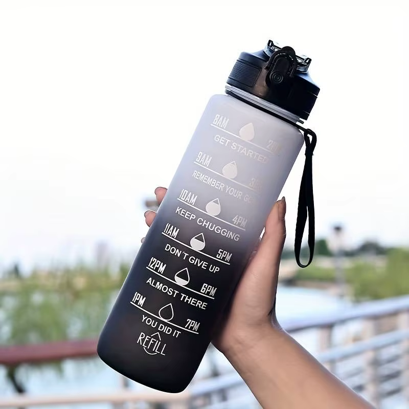 water bottle with straw held in hand - Purple and Yellow - Sky Blue - Turquoise - Pink - Black - Red and Black - Pink and Blue - Pink and Turquoise - Turquoise and Fuchsia - Black and White