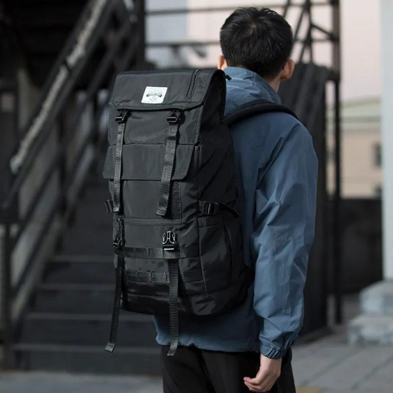 large capacity travel backpack - black - 1 loop attachment - black - 2 loop attachments - black - 1 side loop attachment - black - roll top